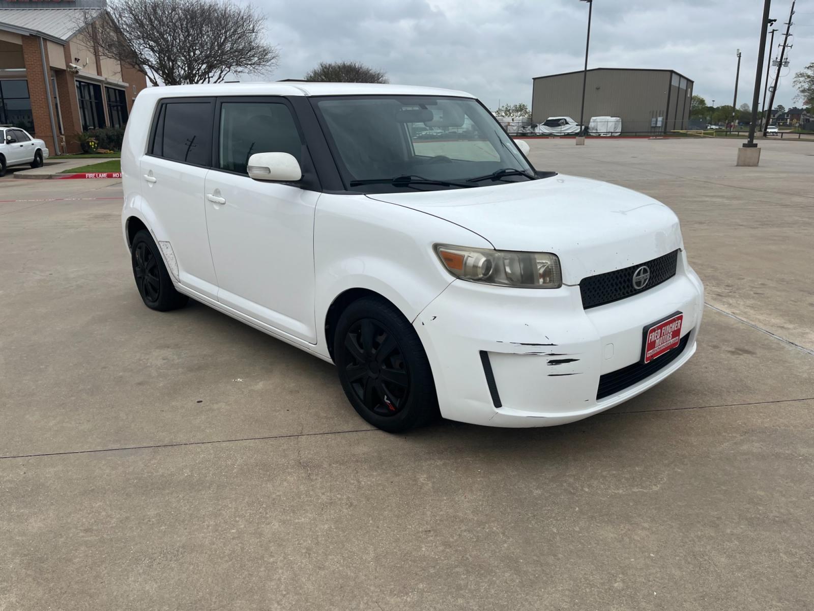 2009 white /black Scion xB Wagon (JTLKE50E591) with an 2.4L L4 DOHC 16V engine, Automatic transmission, located at 14700 Tomball Parkway 249, Houston, TX, 77086, (281) 444-2200, 29.928619, -95.504074 - Photo #0